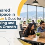 Shared office space in Dehradun with professionals networking and collaborating in a modern workspace.